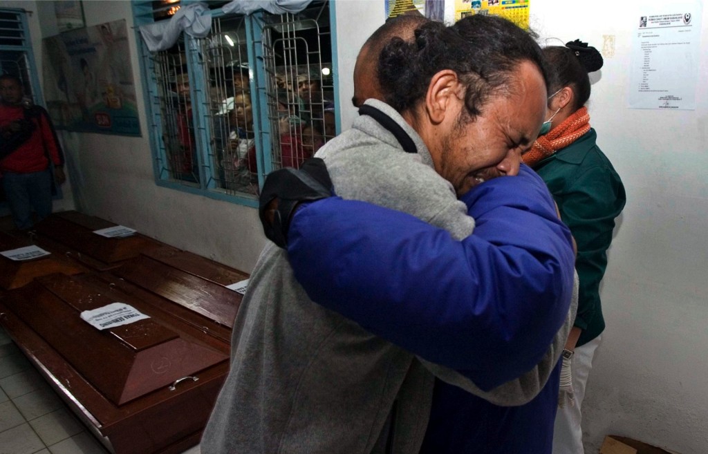 Relatives mourn for the Sinabung volcanic eruption victims at a hospital in Kabanjahe, Karo, North Sumatra. Photo: Dedi Sahputra/EPA/The Jakarta Globe