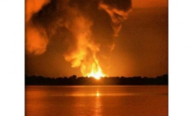 Heatwave: The Petronas gas pipeline in Lawas on fire after the explosion early yesterday morning. Villagers in nearby settlements could feel the heat from the massive fire. Photo: The Star